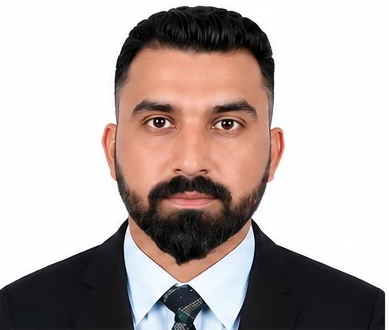 Portrait of Zaheer Abbas in formal attire